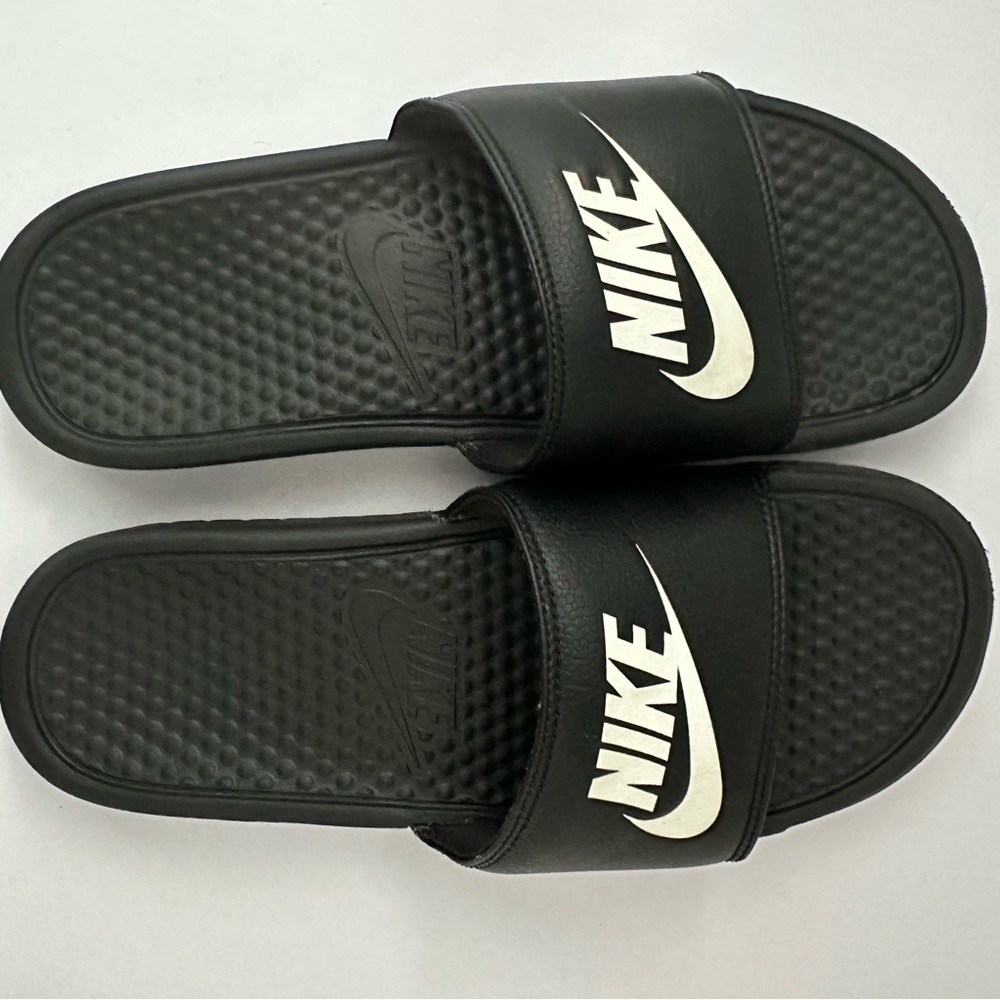 Black Nike slides